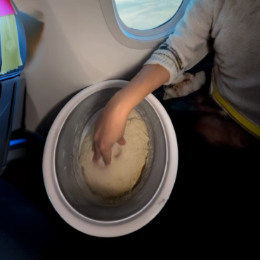 Vlogger Bakes Bread on a Plane and the Internet is Losing It