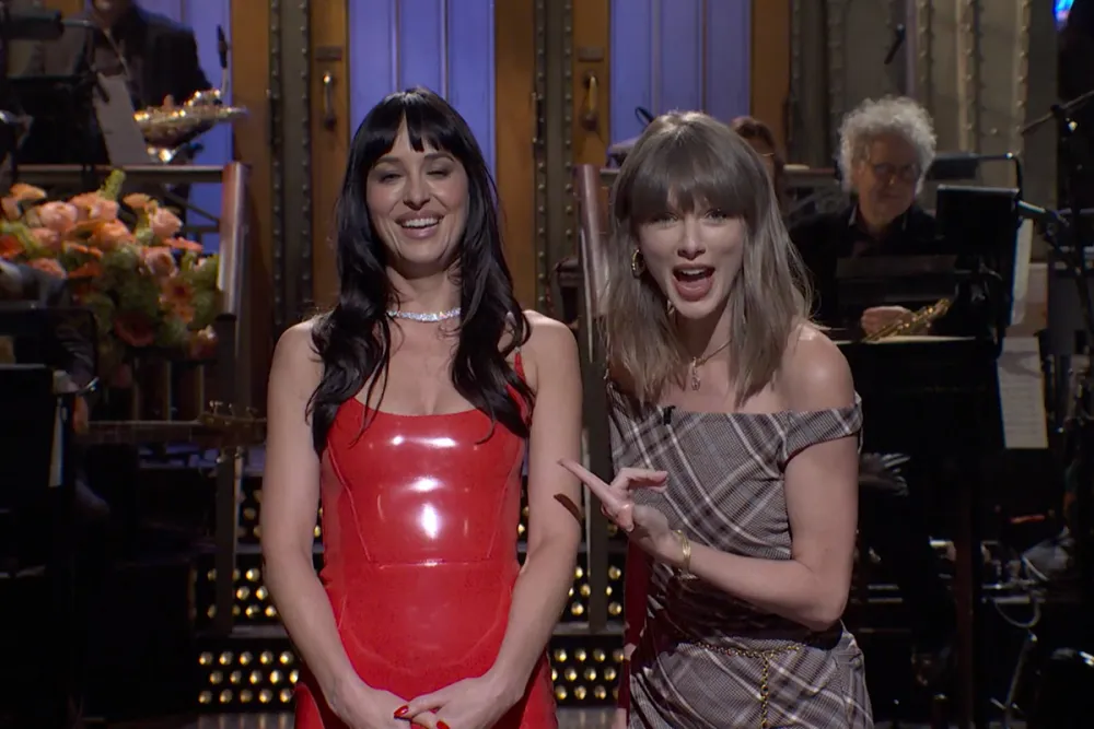 Taylor Swift Crashes Dakota Johnson’s SNL Monologue to Give a Hilarious Relationship Reality Check